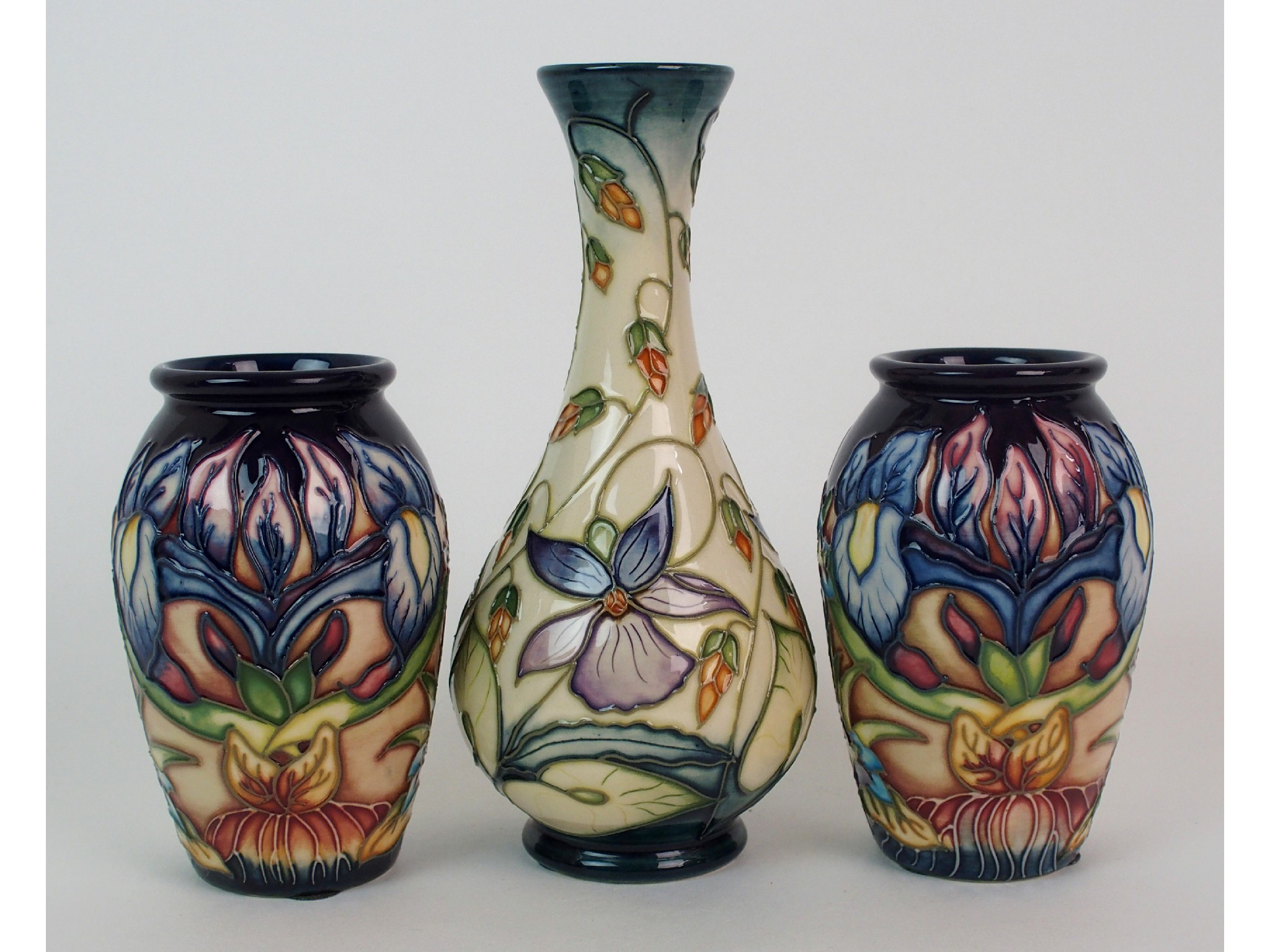 Appraisal: A Pair of Moorcroft Pottery Gentian cabinet vases with a