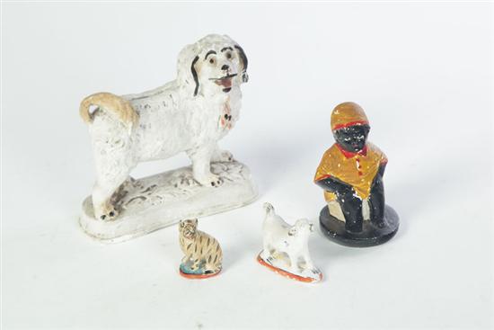 Appraisal: FOUR PIECES OF CHALKWARE American late th century Standing dog