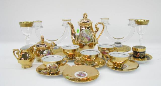 Appraisal: A group of gold decorated tableware including a porcelain tea