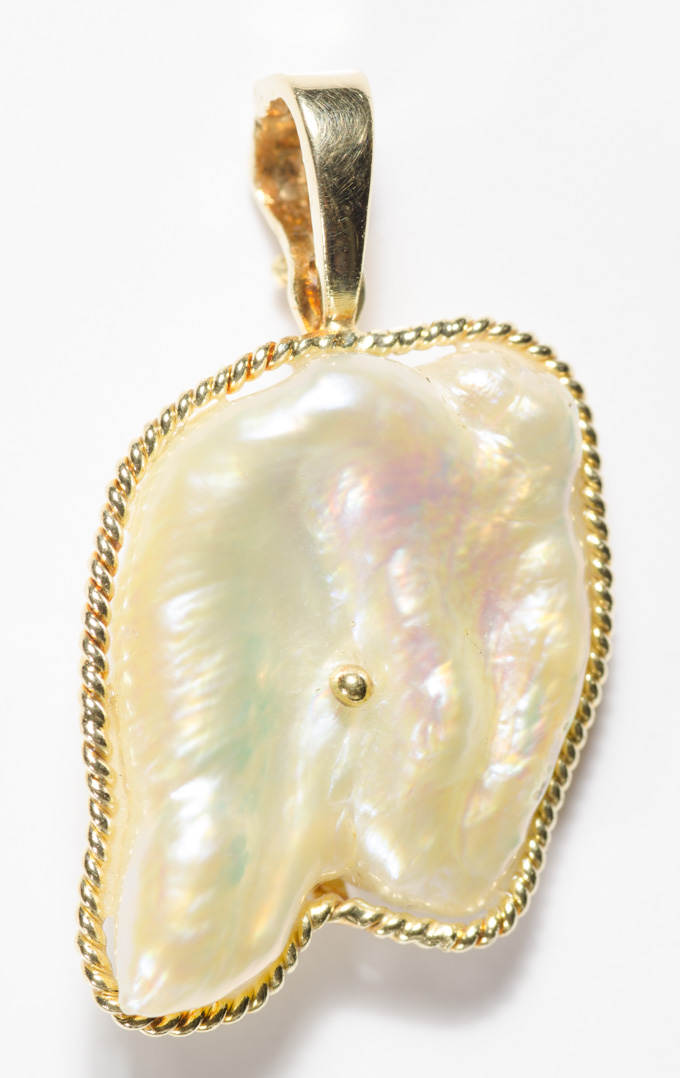 Appraisal: PEARL AND FOURTEEN KARAT GOLD PENDANT set with a large