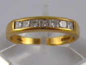 Appraisal: An carat gold channel set princess cut diamond ring size