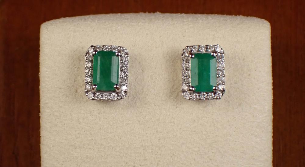 Appraisal: PAIR OF EMERALD AND DIAMOND STUD EARRINGS each k white