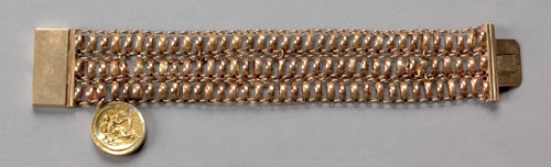 Appraisal: K yellow and rose gold triple link bracelet with one