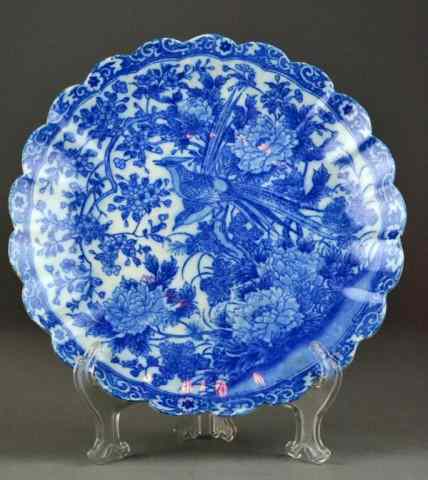 Appraisal: A Fine Chinese Blue White ChargerFooted and scalloped bowl depicting