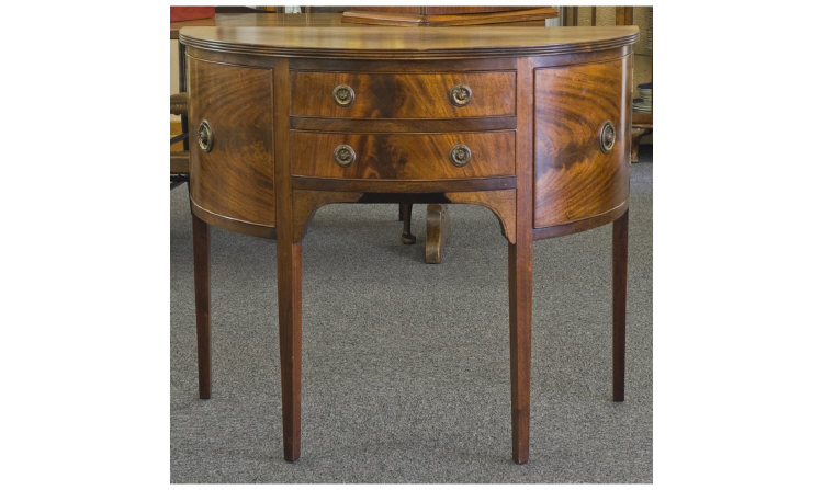 Appraisal: Mahogany Demi Lune Table with side cupboards central drawers