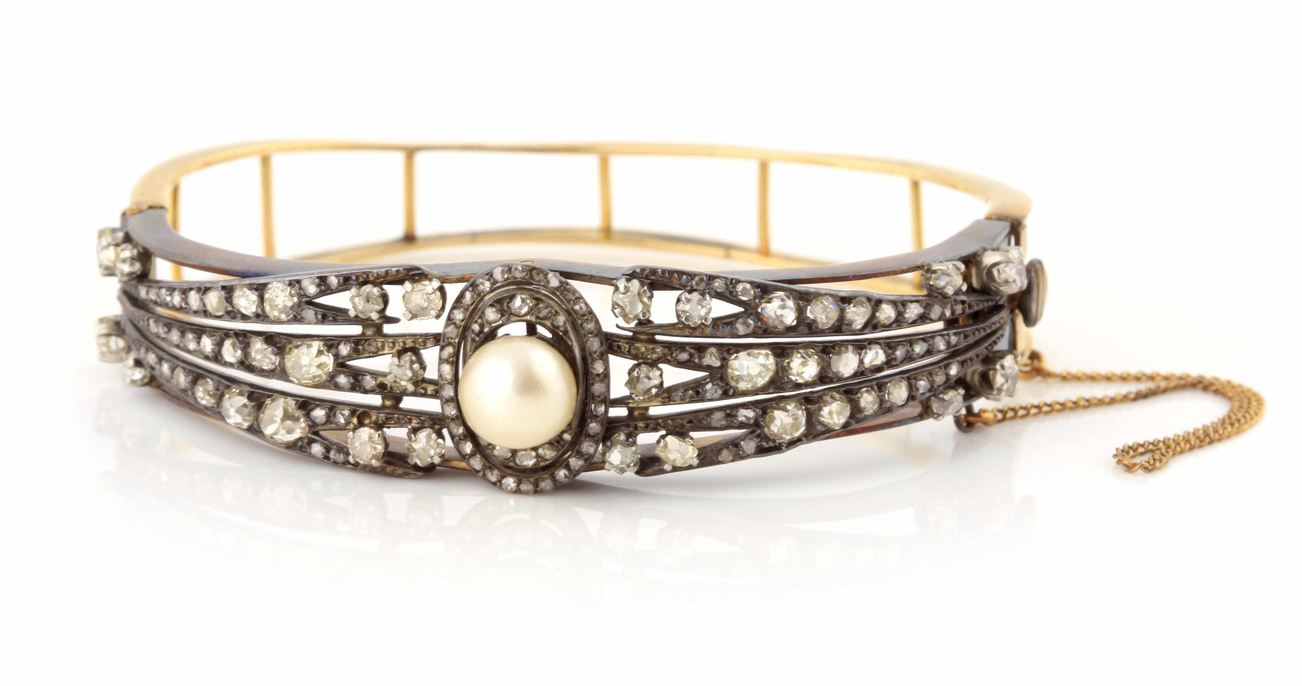 Appraisal: A cultured pearl diamond and silver-topped gold bangle diameter in