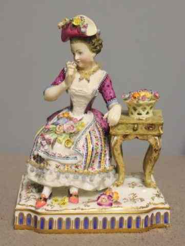 Appraisal: th Century Porcelain Figure of a Woman Seatedat a Table