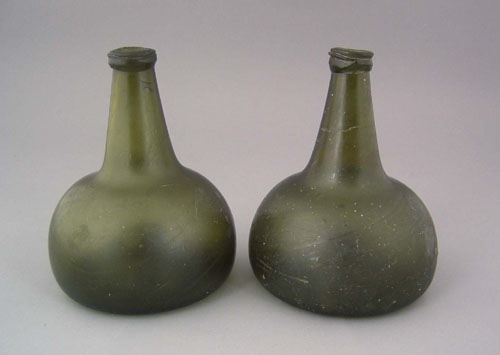 Appraisal: Two green squat bottles th c h