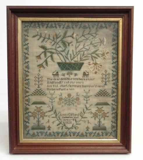 Appraisal: th c sampler featuring large basket of flowers animals urns