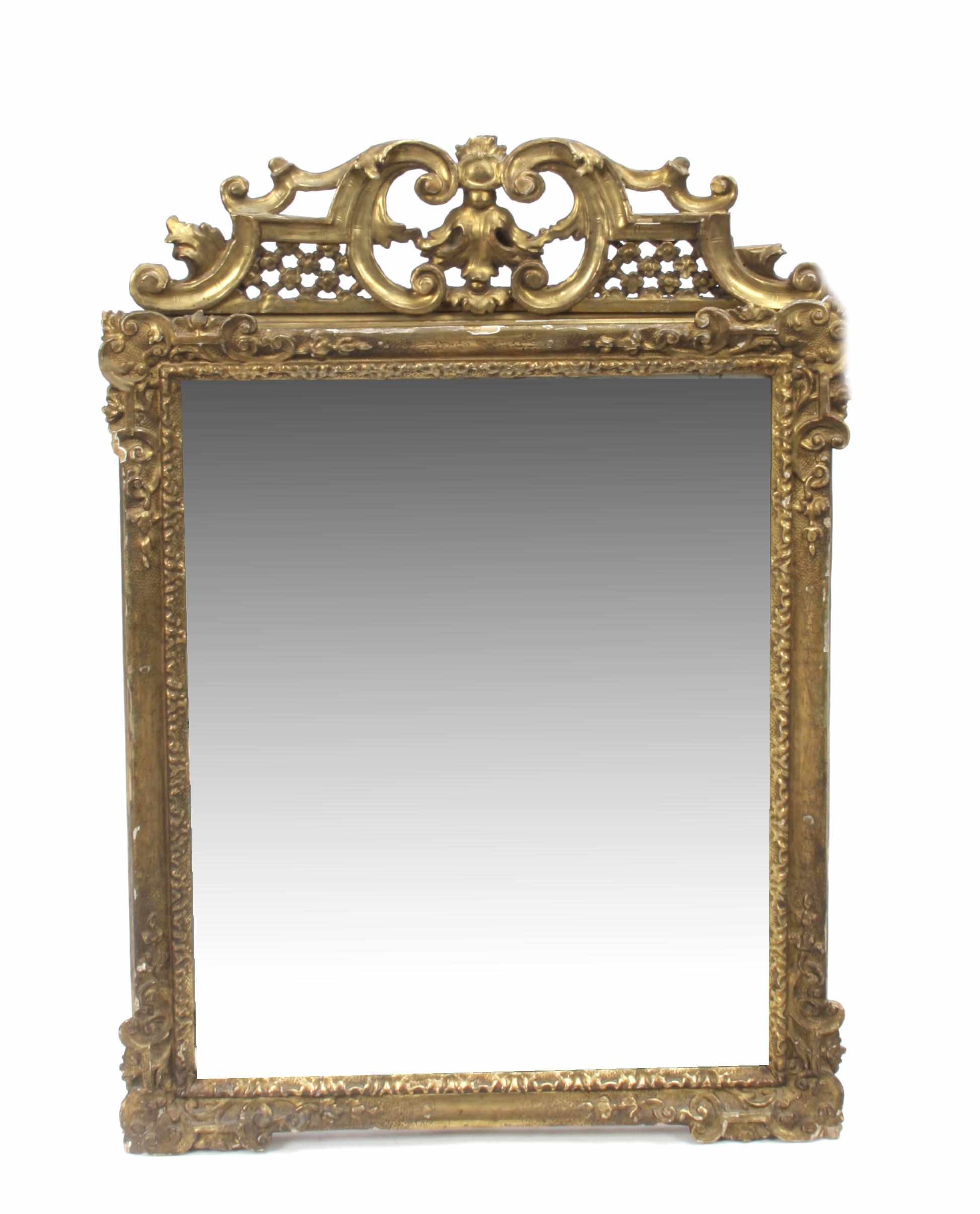 Appraisal: An Italian Rococo style carved giltwood and gesso mirror th