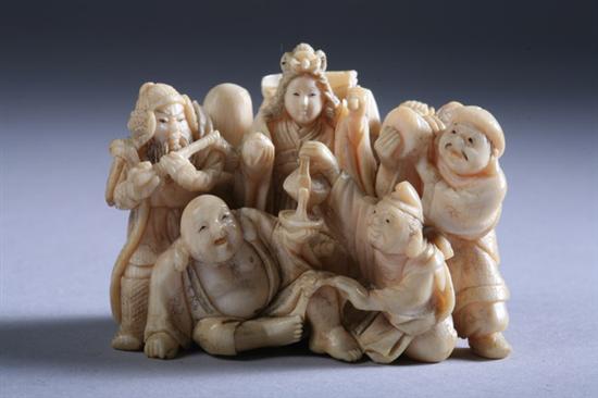 Appraisal: JAPANESE IVORY NETSUKE OF FIGURAL GROUP - in high in