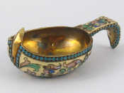 Appraisal: A small Russian silver cloisonne enamelled kovsh with shaded enamels