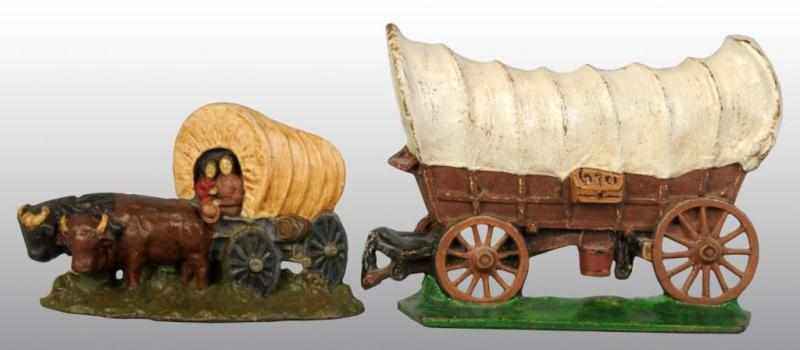 Appraisal: Lot of Cast Iron Doorstops Description Covered wagon and oxen