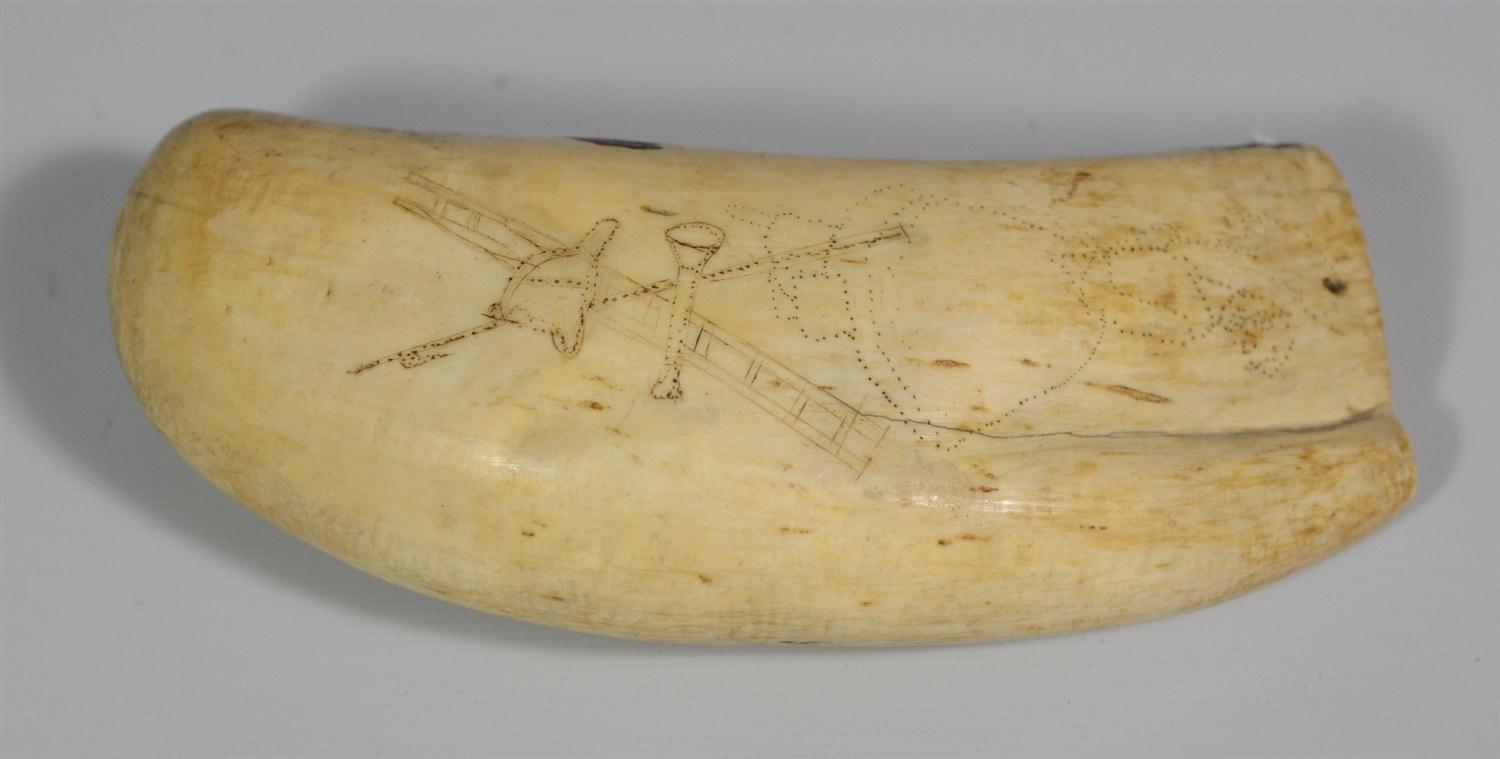 Appraisal: Scrimshawed whale tooth with fire horn helmet and ladder with