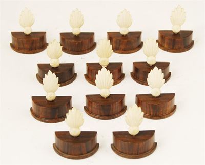 Appraisal: A set of twelve Anglo-Indian rosewood and ivory menu holders