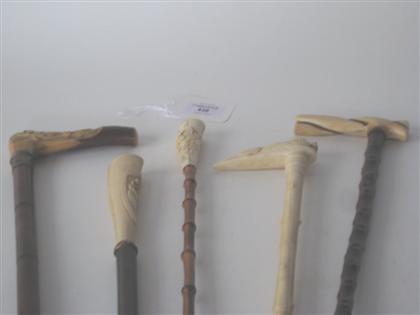 Appraisal: Five walking sticks with ivory bone or horn handles th