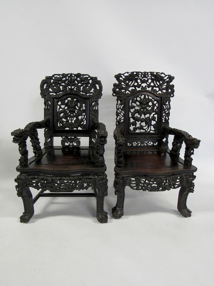 Appraisal: Near Pair of Carved Dragon Chairs th Century Heavily carved