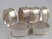 Appraisal: A set of six silver napkin rings of squared oval