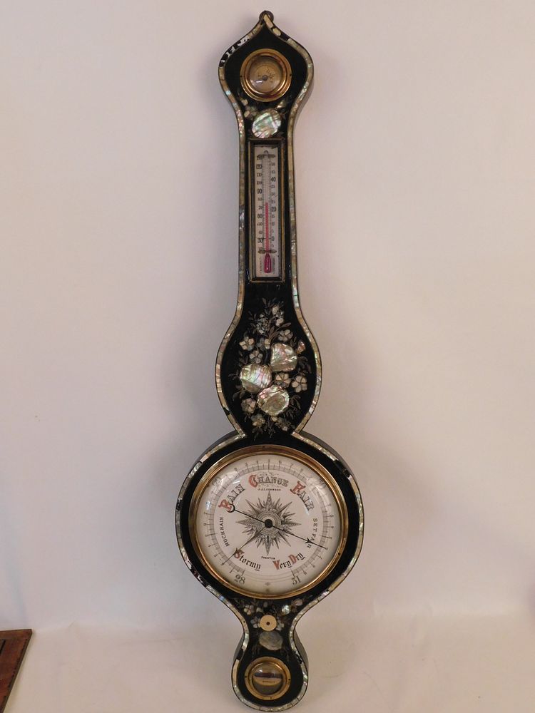 Appraisal: ANTIQUE LOCKWOOD BAROMETER Victorian abalone inlaid and ebonized English wheel