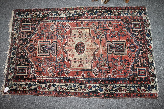 Appraisal: A SMALL HAMADAN RUG of rust ground with geometric designs