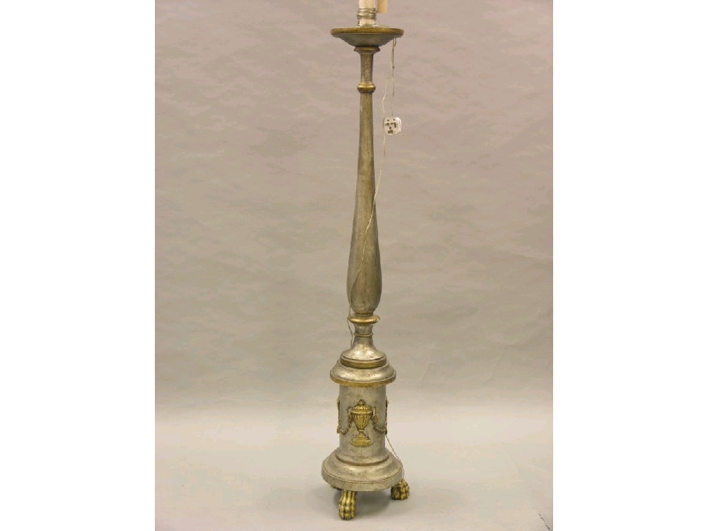 Appraisal: A silvered and gilded floor lamp baluster stem on adam-style