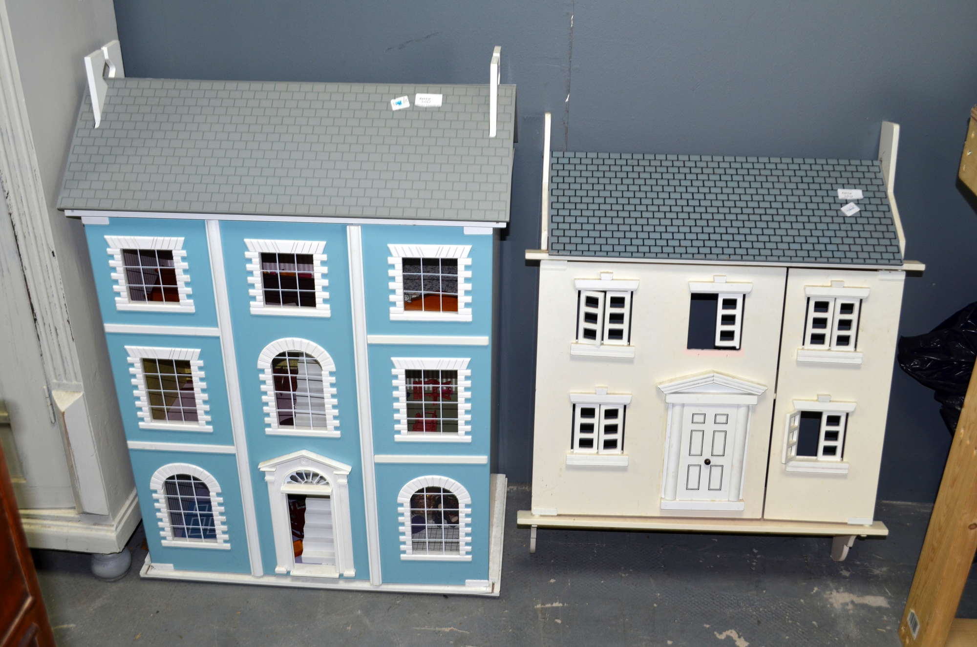 Appraisal: Two doll's houses and a quantity of soft toys