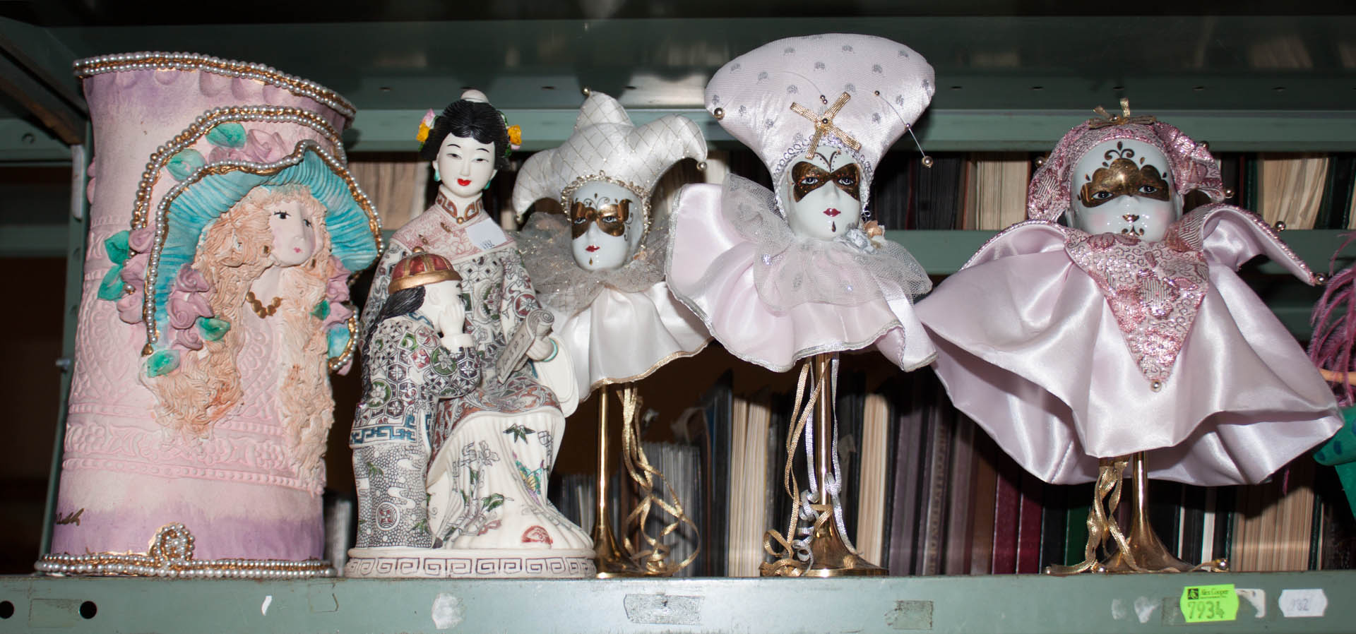 Appraisal: Two shelves of decorative items including collector dolls and figures