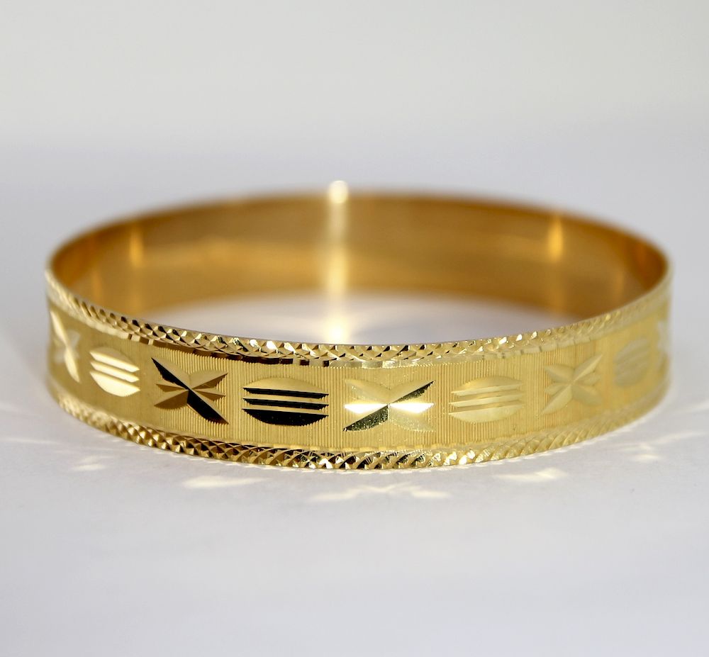 Appraisal: K Gold Etched High Style Bangle Bracelet Unknown th Century