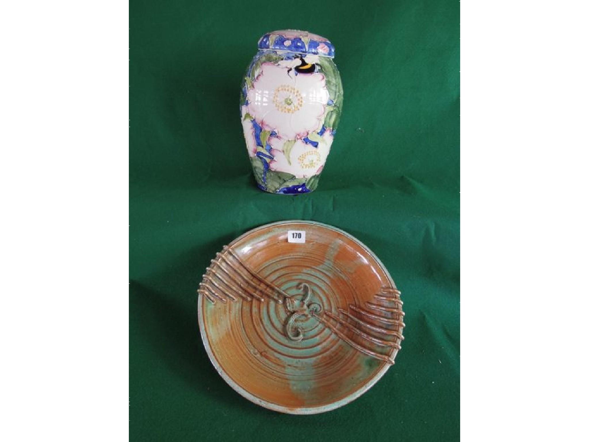 Appraisal: A Westcott Barton pottery charger with raised sides mottled green