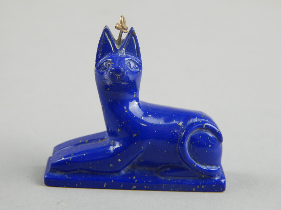 Appraisal: A carved Lapis Egyptian figure with yellow metal pendant link