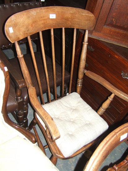 Appraisal: A stick back Windsor open arm chair wide