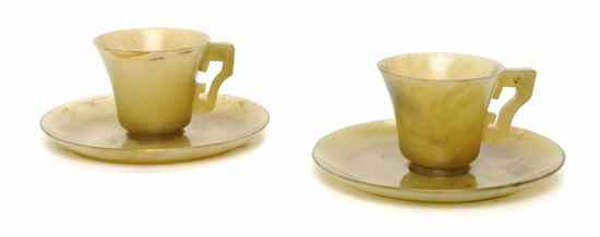 Appraisal: A Pair of Chinese Hardstone Cups and Saucers of semi-transparent