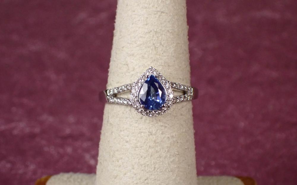 Appraisal: SAPPHIRE DIAMOND AND FOURTEEN KARAT GOLD RING The k white