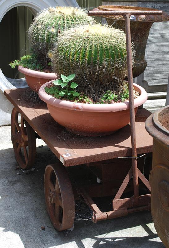 Appraisal: A RUSTIC IRON FOUR WHEELED MINER'S CART x x cm