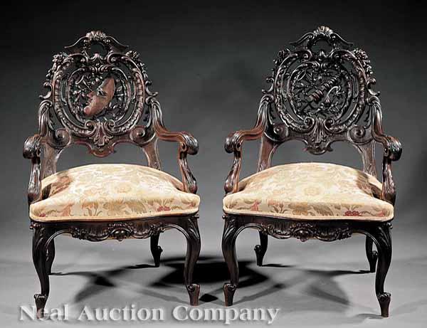 Appraisal: A Pair of Fine Italian Carnival Motif Carved Walnut Armchairs