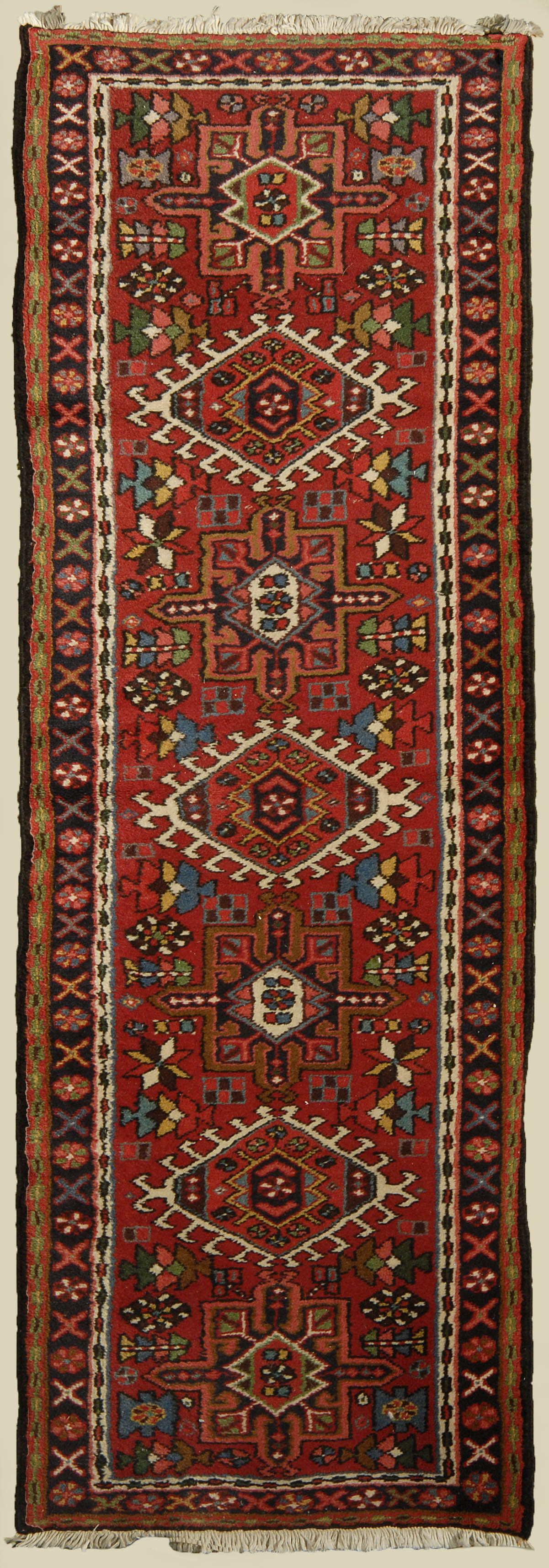 Appraisal: ORIENTAL RUG KARAJA ' x ' Seven gabled and geometric