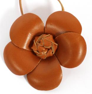 Appraisal: CHANEL TAN LEATHER CAMELLIA NECKLACE CHANEL TAN LEATHER CAMELLIA NECKLACE