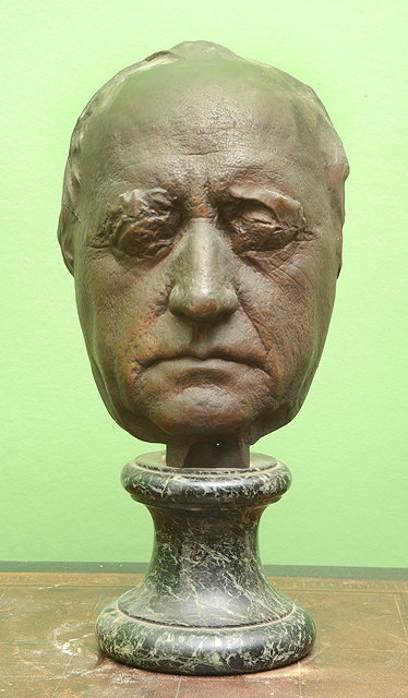 Appraisal: A CAST LIGHT BRONZE LIFE MASK after Goethe mounted on