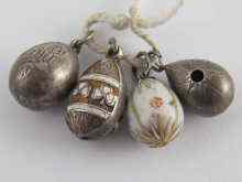 Appraisal: Four Russian silver egg pendants two with enamel three with