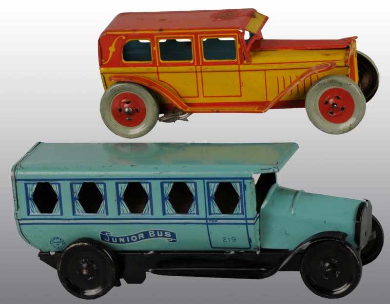 Appraisal: Lot of Tin Chein Vehicle Toys Description American Working Includes