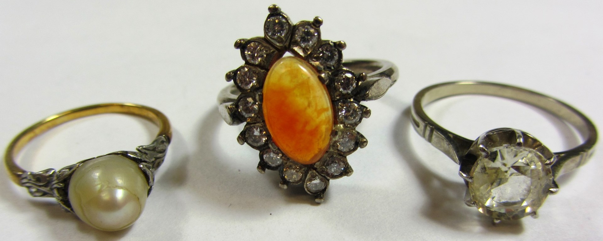 Appraisal: A fire opal diamond and colourless gem set marquise shaped