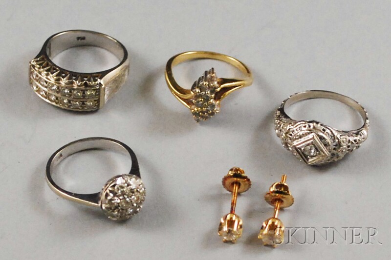 Appraisal: Small Group of Gold and Diamond Jewelry four rings one