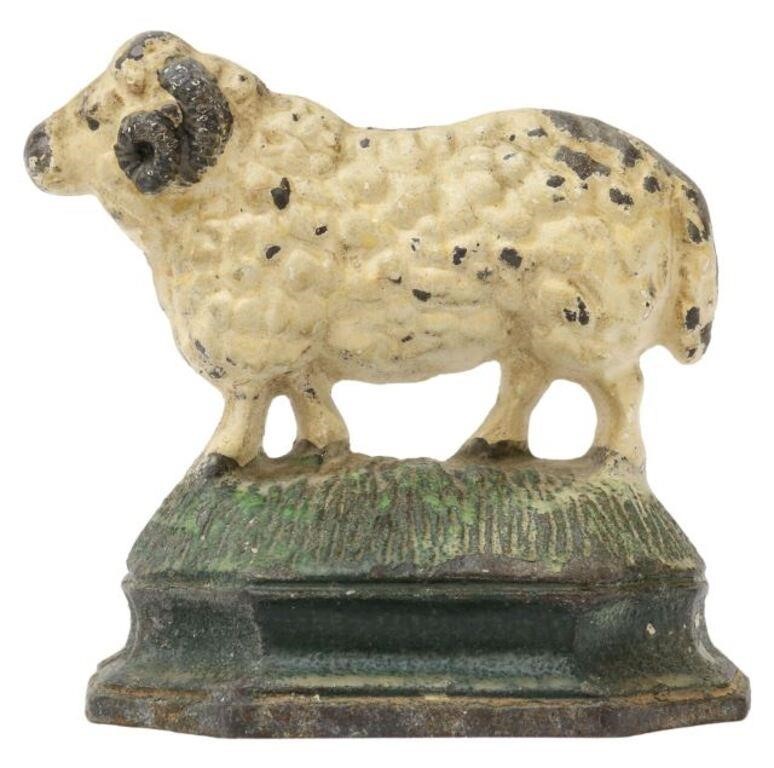 Appraisal: Painted cast iron doorstop in the form of a ram