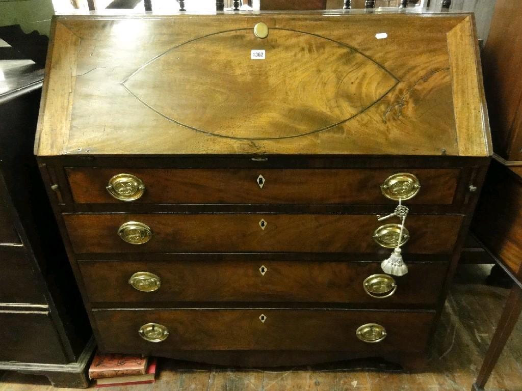 Appraisal: A Georgian mahogany bureau the inlaid fall front enclosing a