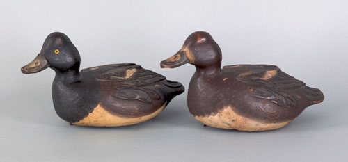 Appraisal: Pair of Orel LeBoeuf St -Anicet Canada bluebill duck decoys