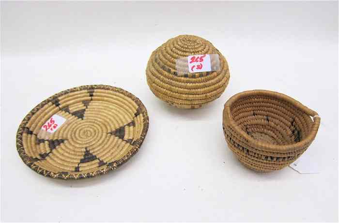 Appraisal: THREE NORTHWEST INDIAN BASKETS child's basketry toy rattle '' diameter