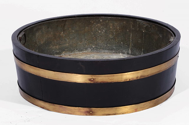 Appraisal: A VICTORIAN COOPERED OAK CIRCULAR WINE COOLER with zinc liner