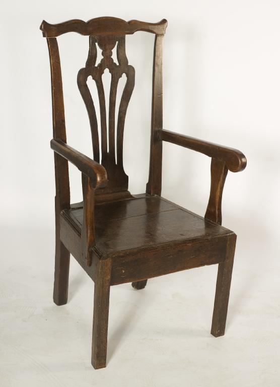 Appraisal: GEORGIAN PROVINCIAL ELM MASTERS CHAIR IN CHIPPENDALE STYLE with plank