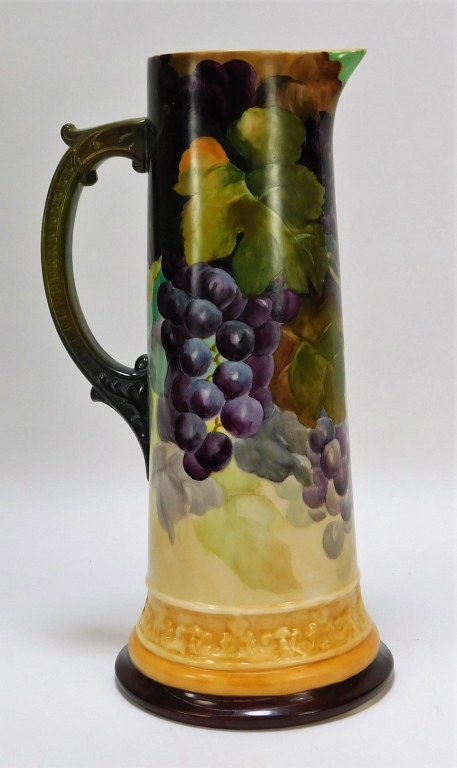 Appraisal: AMERICAN BELLEEK PURPLE GRAPES TANKARD PITCHER United States Early th