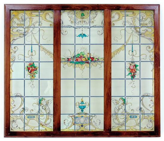 Appraisal: English three-panel stained glass and paint-decorated window panes divided by